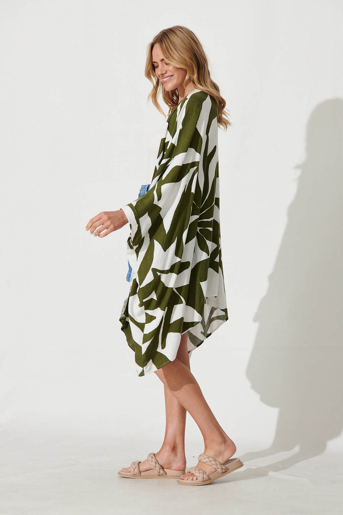 Heron Cape In Cream And Green Geo Print - side