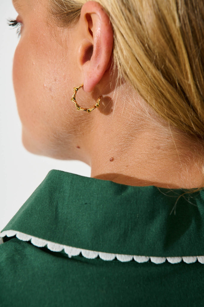 Juliana Textured Circle Hoop Earrings in Gold on model back detail